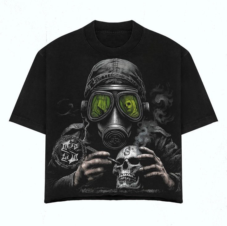 Black t-shirt with a graphic design of a person in a gas mask and skull, on a white background.