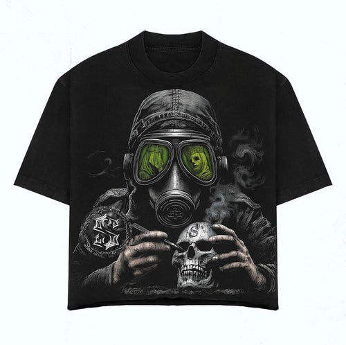 Black t-shirt with a graphic design of a person in a gas mask and skull, on a white background.