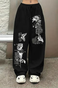 Vintage Newspaper & Butterfly Graphic Print Black Joggers | Streetwear