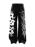 Asymmetric Tribal and Star Graphic Print Black Joggers | Streetwear