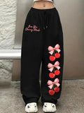 "Love You Cherry Much" Bow Graphic Print Black Joggers | Streetwear